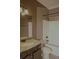 Bathroom with granite countertops and shower-tub combination at 505 Mirror Lake Pkwy, Villa Rica, GA 30180