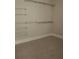 Walk-in closet equipped with wire shelving for easy organization and storage at 505 Mirror Lake Pkwy, Villa Rica, GA 30180