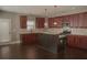 Beautiful kitchen with granite countertops, stainless steel appliances, and a functional island at 505 Mirror Lake Pkwy, Villa Rica, GA 30180