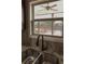 Close-up of a modern sink with granite countertop, set against a backdrop of a screened-in porch view at 505 Mirror Lake Pkwy, Villa Rica, GA 30180