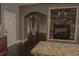 View of the living room featuring a stone fireplace and hardwood flooring at 505 Mirror Lake Pkwy, Villa Rica, GA 30180