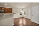 Bright dining area features hardwood floors, modern lighting, and neutral paint colors at 559 Myrle Trace Ln, Suwanee, GA 30024
