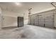 Spacious garage with plenty of room for storage and parking, plus epoxy floor at 559 Myrle Trace Ln, Suwanee, GA 30024