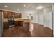 Spacious kitchen with stainless steel appliances, granite countertops and access to the dining area at 559 Myrle Trace Ln, Suwanee, GA 30024