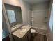Bathroom featuring a granite sink and a shower-tub combo at 108 Deer Xing, Temple, GA 30179