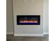 Stylish electric fireplace adds a touch of warmth and modern design to the living space at 108 Deer Xing, Temple, GA 30179