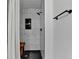 Modern bathroom featuring a tiled shower with built in niche, wood bench, and sleek hardware at 2508 Wagon Trce, Duluth, GA 30096