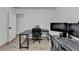 Bedroom or home office with lots of light, wood laminate flooring, and bright white walls at 2508 Wagon Trce, Duluth, GA 30096