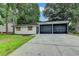 Charming single-story home with a well-maintained lawn and a two-car garage at 2508 Wagon Trce, Duluth, GA 30096