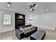 Bright living room showcasing a stone fireplace, large windows, and comfortable seating at 2508 Wagon Trce, Duluth, GA 30096