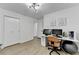 Bright office space with wood-look floors, a closet, and a neutral color palette at 2508 Wagon Trce, Duluth, GA 30096
