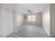 Bright bedroom featuring a ceiling fan and luxury vinyl plank flooring at 260 Manning Sw Rd # 76, Marietta, GA 30064