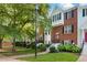 Townhome with brick facade, black shutters, and landscaped front yard at 260 Manning Sw Rd # 76, Marietta, GA 30064