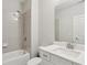 Bathroom with modern fixtures, shower/tub combo, and a white vanity with ample counter space at 3332 Old Concord Se Rd, Smyrna, GA 30082