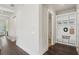 Hallway with mudroom area featuring built-in shelving and bench seating at 3332 Old Concord Se Rd, Smyrna, GA 30082
