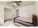 Bedroom with closet and ceiling fan at 574 Horseshoe Sw Cir, Lilburn, GA 30047
