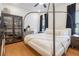 Bedroom showcasing a neutral color palette, hardwood floors, and stylish decor at 2673 Caruso Way, Atlanta, GA 30339