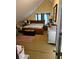 Bedroom with sloped ceiling, large bed, dresser, and carpet at 7073 Stonecreek Dr, Douglasville, GA 30134