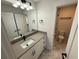 Stylish bathroom featuring modern vanity and separate toilet room at 72 Hanover Dr, Villa Rica, GA 30180