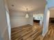 Bright dining area featuring elegant chandelier and modern trim at 72 Hanover Dr, Villa Rica, GA 30180