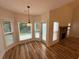 Cozy dining room with hardwood floors, many windows and a fireplace at 72 Hanover Dr, Villa Rica, GA 30180