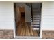 Welcoming entryway featuring hardwood floors and staircase to the upper level at 72 Hanover Dr, Villa Rica, GA 30180