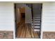 Welcoming entryway with hardwood floors and a staircase at 72 Hanover Dr, Villa Rica, GA 30180