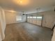Spacious two-car garage with an automatic door, ample room for parking, and extra storage at 72 Hanover Dr, Villa Rica, GA 30180