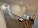 Bright hallway with a view of the dining room and fireplace at 72 Hanover Dr, Villa Rica, GA 30180