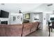 Bright living room with hardwood floors, fireplace, and large windows at 784 Crestworth Xing, Powder Springs, GA 30127