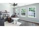 Living room with hardwood floors, natural light, and a view of the backyard at 784 Crestworth Xing, Powder Springs, GA 30127