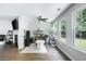 Living room featuring hardwood floors, natural light, and plenty of space at 784 Crestworth Xing, Powder Springs, GA 30127