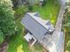 Birds-eye view of the home highlighting roof, the backyard, deck, patio, and driveway at 150 Kensley Way, Dallas, GA 30157