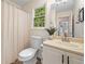 Clean bathroom featuring a window providing natural light and a shower with a curtain at 150 Kensley Way, Dallas, GA 30157