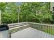 Overhead view of a spacious deck area with an outdoor grill and string lights at 150 Kensley Way, Dallas, GA 30157