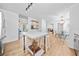 Open kitchen with a center island, stainless appliances, and hardwood floors at 150 Kensley Way, Dallas, GA 30157
