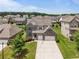 Attractive brick two-story home with a two-car garage in a well-kept suburban neighborhood at 4154 Hawking Dr, Suwanee, GA 30024