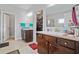 Bathroom featuring double sinks, modern fixtures, and a clean, well-lit space at 4154 Hawking Dr, Suwanee, GA 30024