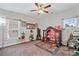 Inviting bedroom with a ceiling fan and decorative elements creating a serene atmosphere at 4154 Hawking Dr, Suwanee, GA 30024