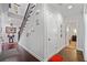 Entryway with wood floors, stairs, and neutral-colored walls at 4154 Hawking Dr, Suwanee, GA 30024