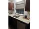 Modern kitchen with granite countertops, stainless steel appliances and tile backsplash at 4164 River Shoals Ct, Duluth, GA 30097