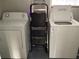 The laundry room is equipped with a washer and dryer at 4164 River Shoals Ct, Duluth, GA 30097