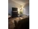 Inviting living room featuring a fireplace, hardwood floors, and comfortable seating area at 4164 River Shoals Ct, Duluth, GA 30097