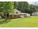 Charming two-story home with brick accents, white siding, and a welcoming covered front porch at 6000 Malibu Drive Dr, Morrow, GA 30260