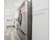 Modern kitchen with stainless steel fridge and plenty of storage at 6000 Malibu Drive Dr, Morrow, GA 30260