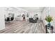 Spacious, open-concept living area features hardwood floors and lots of windows at 6000 Malibu Drive Dr, Morrow, GA 30260
