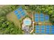 Expansive community aerial view with multiple blue tennis courts, pool, playground, and mature landscaping throughout the area at 87 Rushing View Gln, Dallas, GA 30157