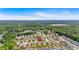 Aerial view of a residential neighborhood showcasing the home's location with expansive woodland views at 87 Rushing View Gln, Dallas, GA 30157
