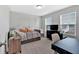Cozy bedroom featuring a daybed, desk, and two bright windows at 87 Rushing View Gln, Dallas, GA 30157
