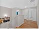 Bright upstairs hallway with hardwood floors and access to various rooms in the home at 87 Rushing View Gln, Dallas, GA 30157